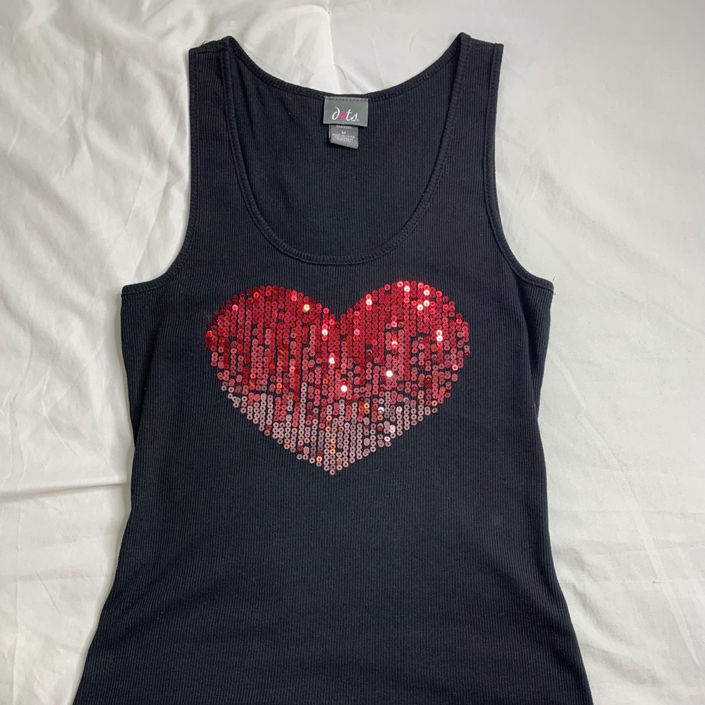 A black tank top with a red heart design!